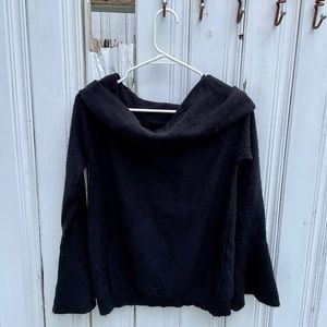 Off the shoulder black Love More knitted sweater.